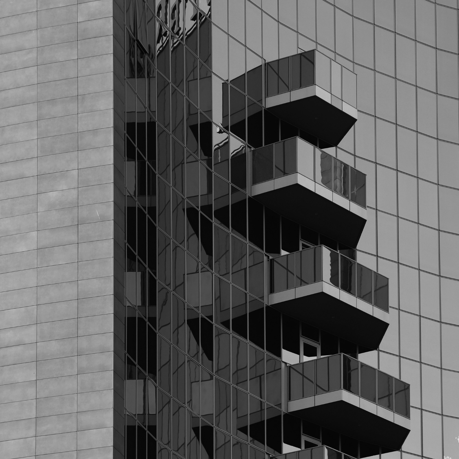 facade-balconies-modern-building-with-glass-panels